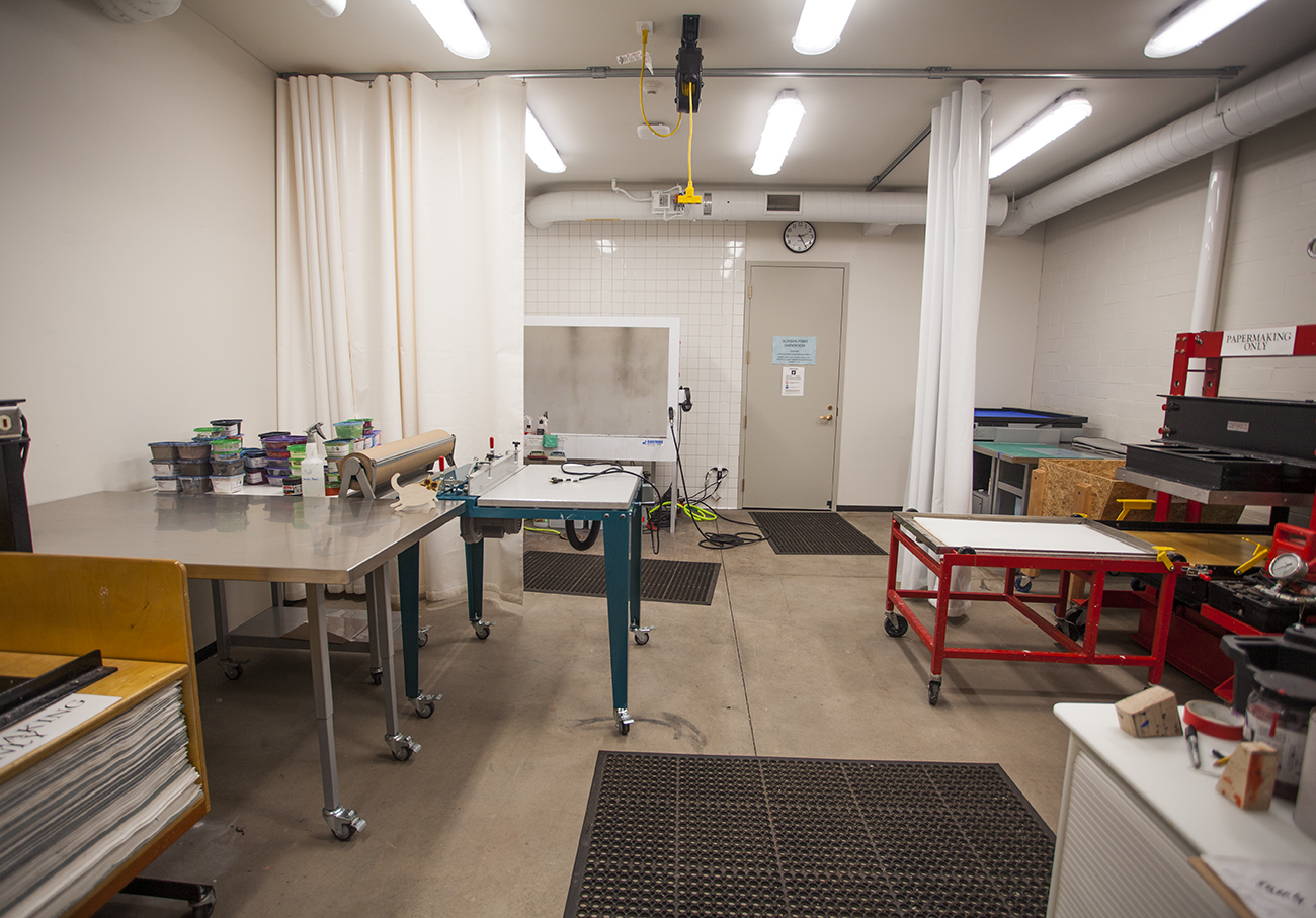 papermaking and screenprinting room with white curtain partially dividing the space