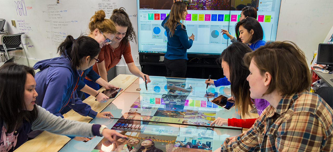 Students use MultiTaction display in Wellesley's Human Computer Interaction Lab