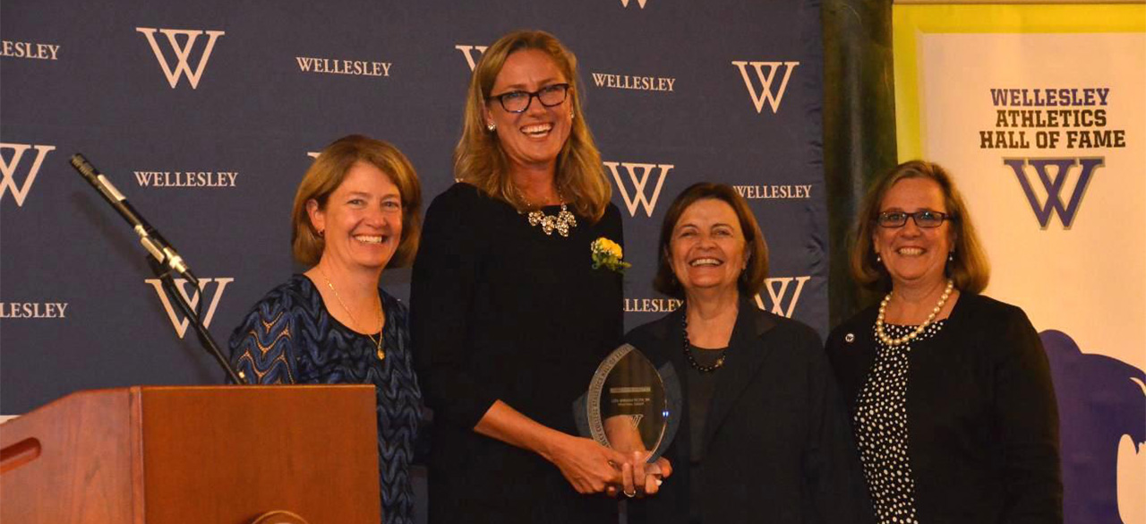Liza Janssen Petra '94, shown second left, was inducted into Wellesley's Athletics Hall of Fame in 2014, and the New England Basketball Hall of Fame this weekend.