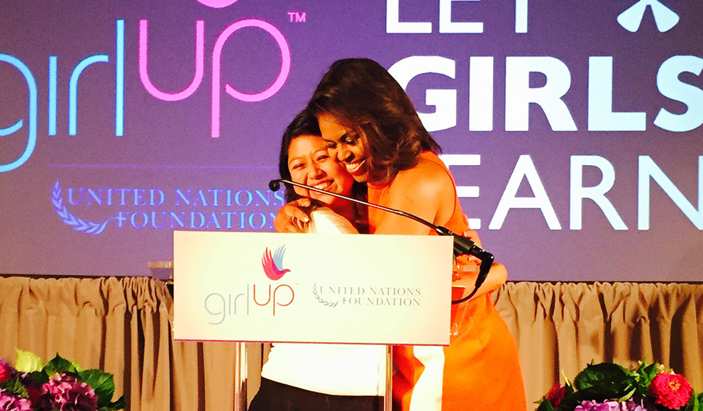 Rocio Ortega '16 receives a hug from First Lady Michelle Obama