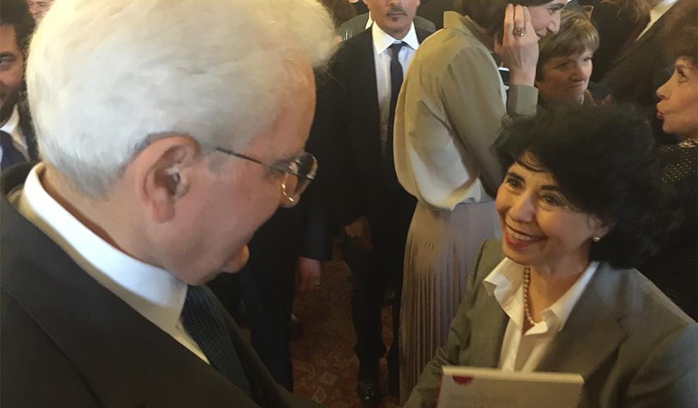 Senior Lecturer Flavia Laviosa is congratulated by Italian President Sergio Mattarella 