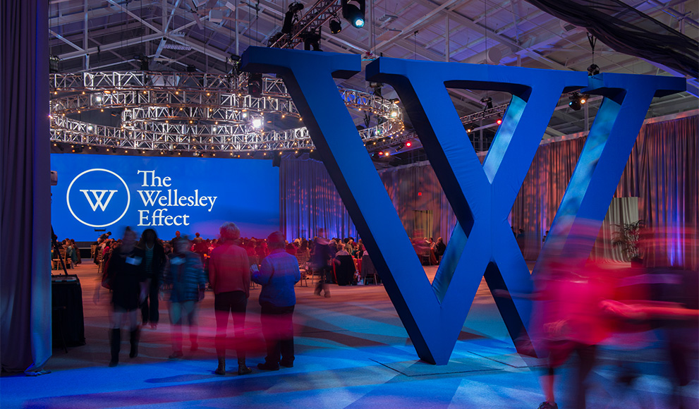 An interior photo of the Wellesley fieldhouse decorated for the launch of the Campaign for Wellesley