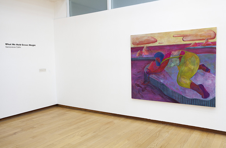 at right large predominantly pink painting of woman performing a mysterious action at the edge of water, wall at left has wall text for the show