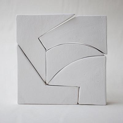 white wooden blocks arranged into a square