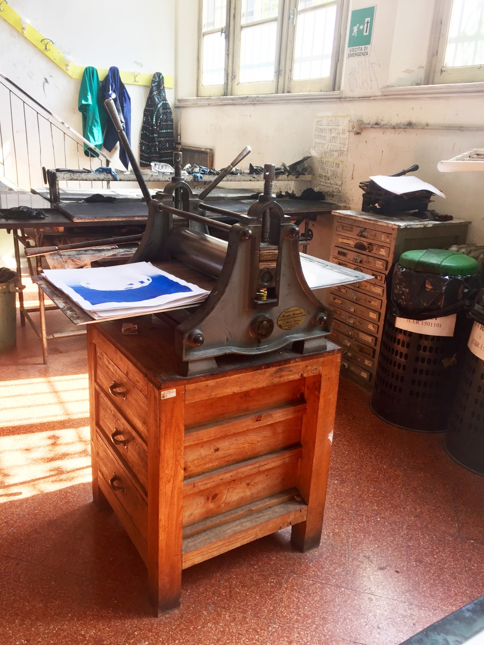 small printing press in printmaking studio