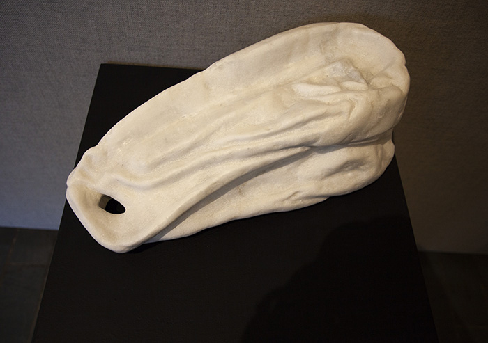 top view of a white marble sculpture of a plastic bag